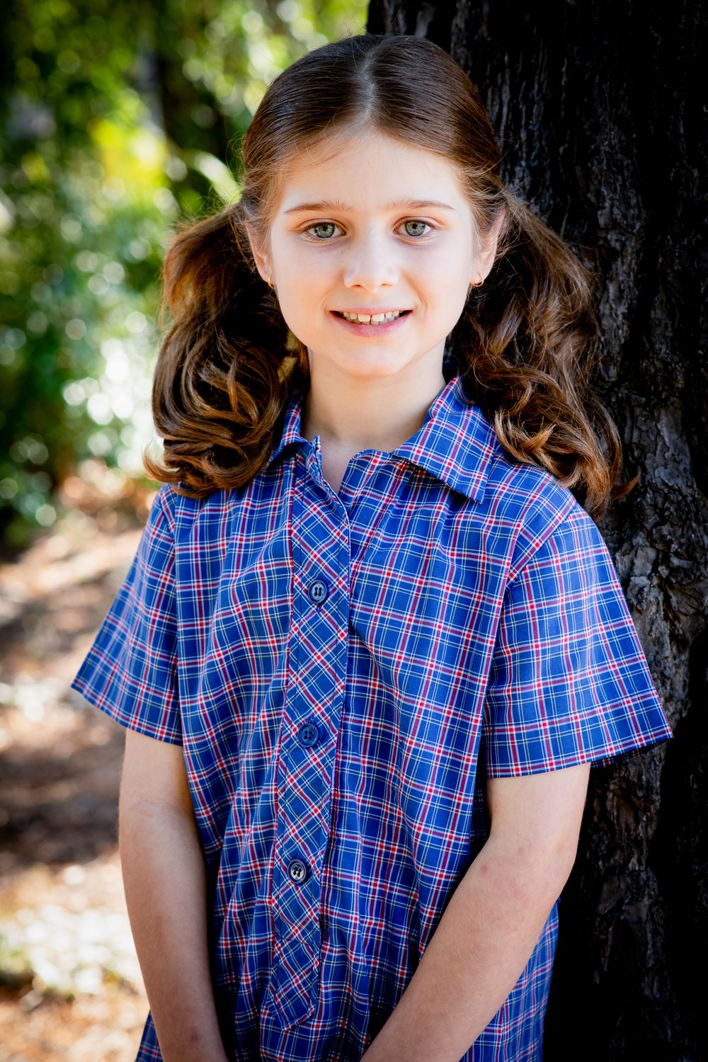 A relaxed, natural school portrait of a child